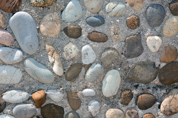 Grå stenar vägg bakgrund — Stockfoto