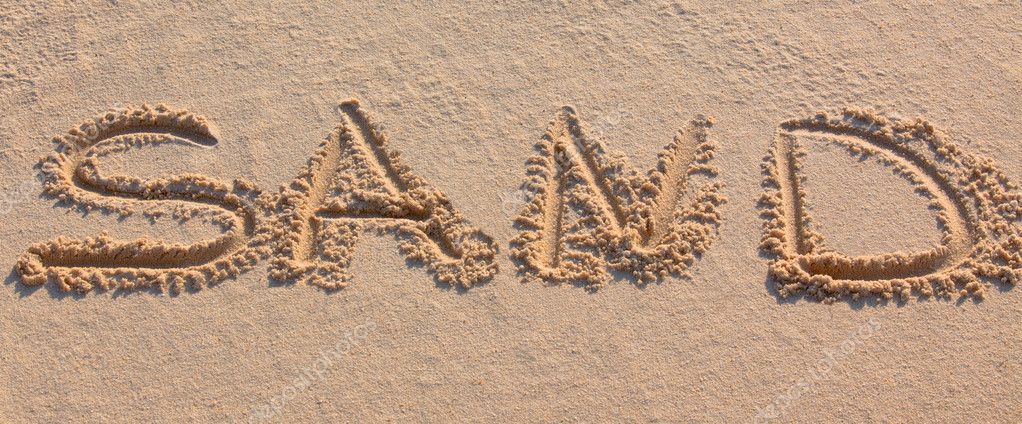 word-sand-written-on-beach-stock-photo-dvoevnore-4694863