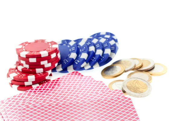 Покерные фишки, карты и монеты евро — стоковое фото