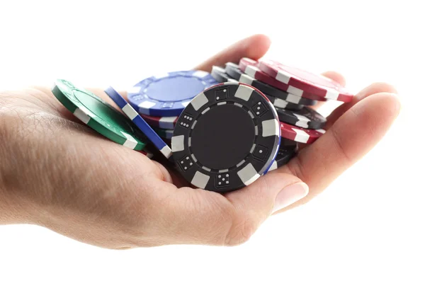 Multicolor poker chips handfull — Stockfoto