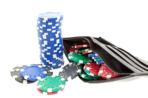 Poker chips in black leather purse — Stock Photo, Image