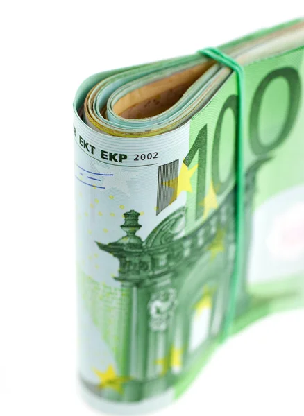 Rolled with rubber euro notes — Stock Photo, Image