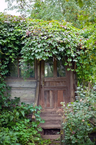 Entrance of old abandoned garden house — Stock Photo, Image