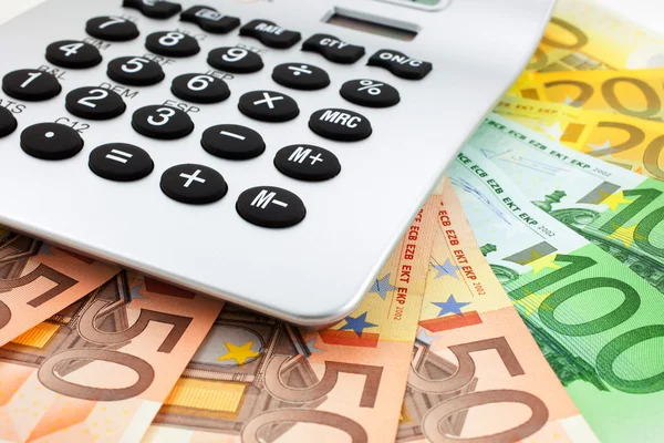 Euro notes with calculator — Stock Photo, Image