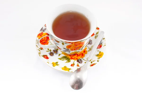 Класична Чашка Чаю Червоними Помаранчевими Квітами — стокове фото