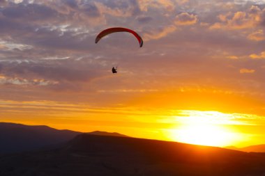 Paraglider flight in Crimea clipart