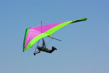 Hang gliding in Crimea taken in summer clipart