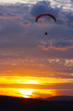 Paraglider flight in Crimea clipart