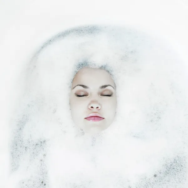 Young girl in the suds — Stock Photo, Image