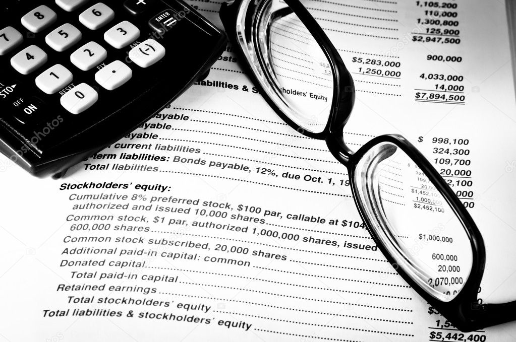 Eye glasses on an accounting book