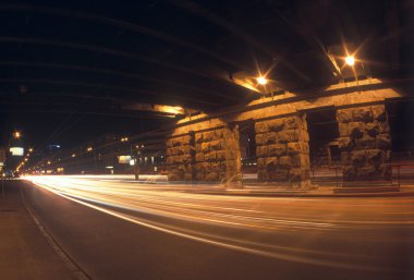 Motion blur of car lights on street at night. Please see some similar images in my portfolio. clipart