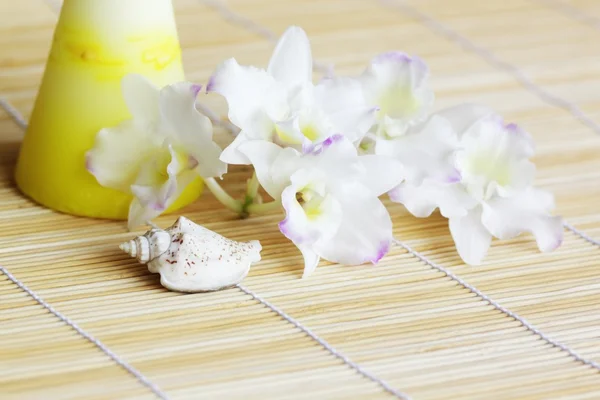 Lighting Candle Spa Towel Stones Tender Orchids — Stock Photo, Image