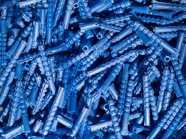 Modré plastové hmoždinky — Stock fotografie