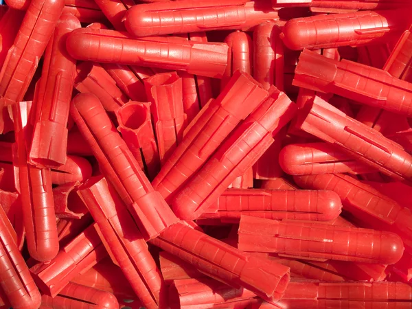Red plastic plugs — Stock Photo, Image