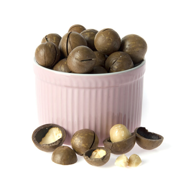 a lot of macadamia nuts on white