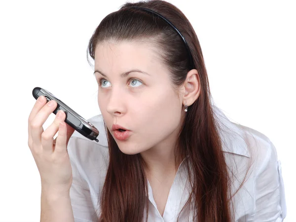 stock image The woman with a cellular telephone on white a background