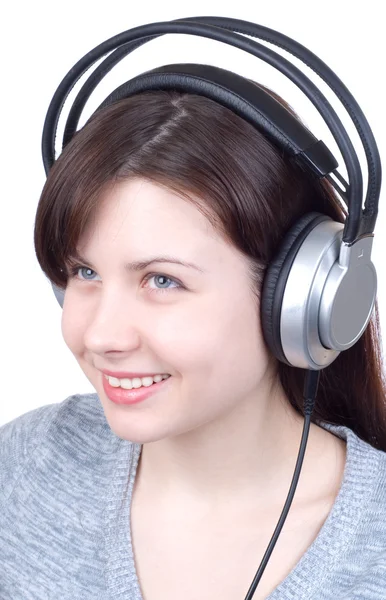 The girl in ear-phones — Stock Photo, Image