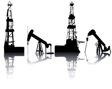 Silhouettes of units for oil recovery on a white background clipart