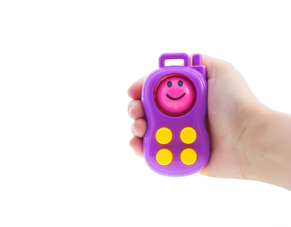 Beyaz arka plan üzerinde izole elinde oyuncak telefon — Stok fotoğraf