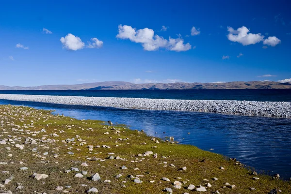 stock image White beach of the lake Namsto.