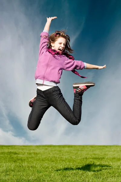 stock image Happy joy girl jum in the air