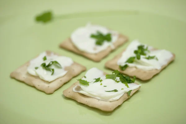 stock image Thin crackers with cream cheese