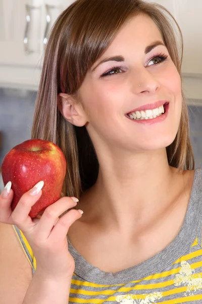 Young woman in her kitchen — Stock Photo, Image