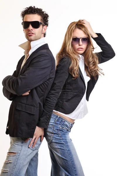 Young sexy couple posing in studio — Stock Photo, Image