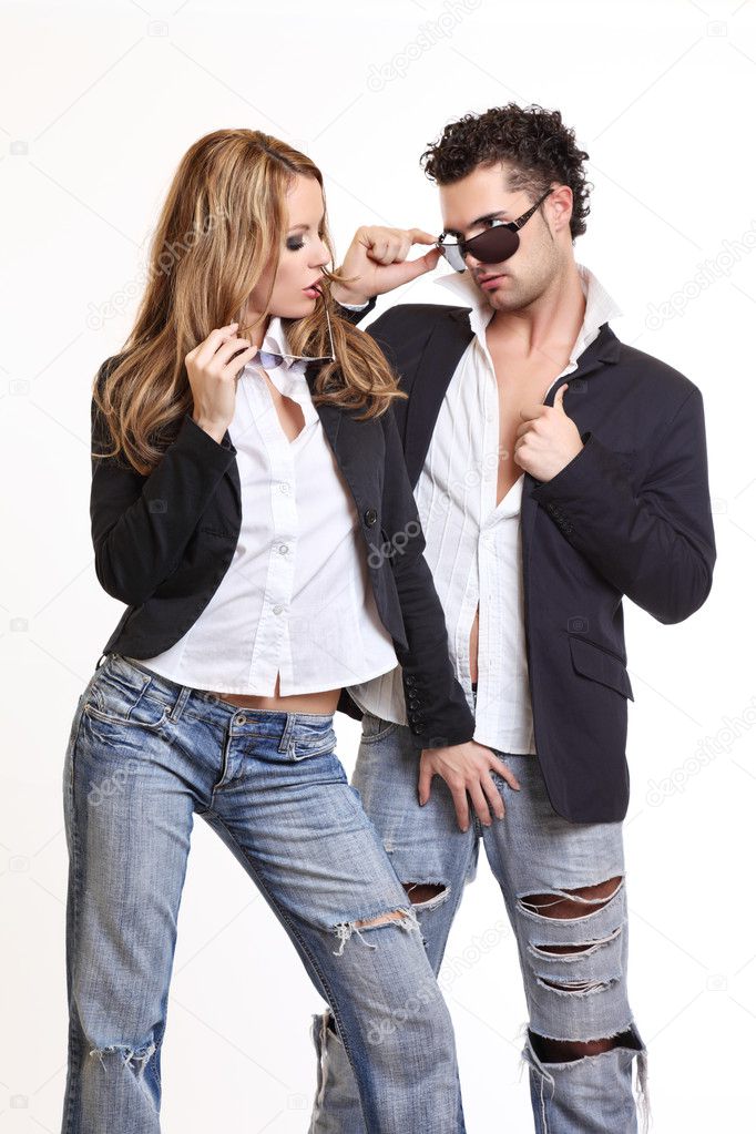Sexy woman flirthing with a handsome man on white background