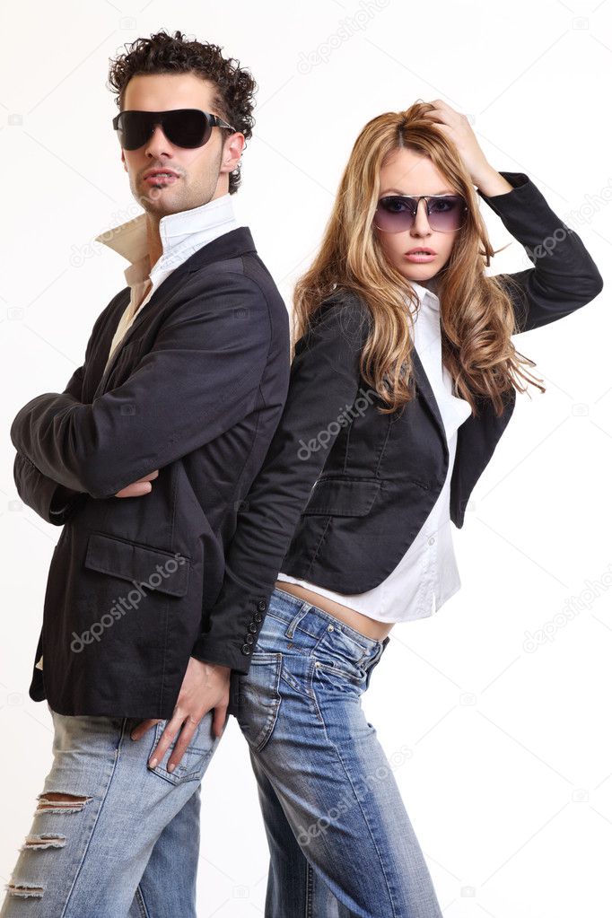 Young sexy couple posing in studio