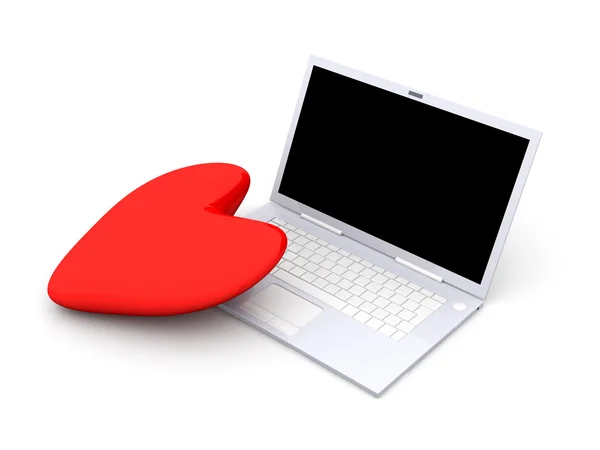 心和一台笔记本电脑 — 图库照片
