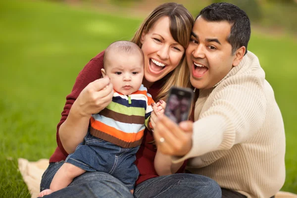 Happy Mixed Race Parents and Baby Boy Taking Self Portraits — Stock Photo, Image