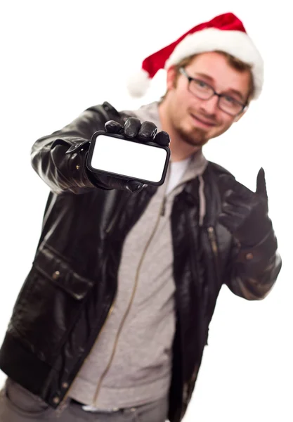 Man with Santa Hat Holding Out Blank Cell Phone — Stock Photo, Image