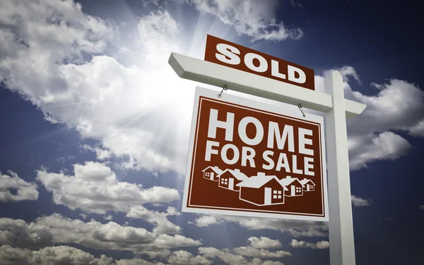 Red Sold Home Sale Real Estate Sign Beautiful Clouds Blue — Stock Photo, Image