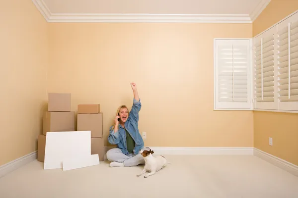 Excited Woman on Phone Near Boxes and Blank Signs — Stock Photo, Image