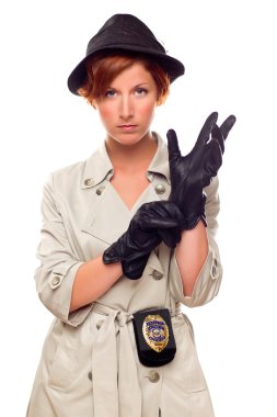 Red Haired Female Detective Putting on Gloves Wearing a Trenchco clipart