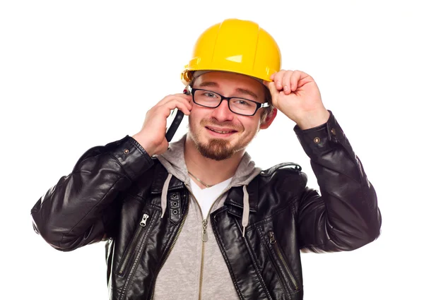 Schöner junger Mann mit schwerem Hut am Telefon — Stockfoto