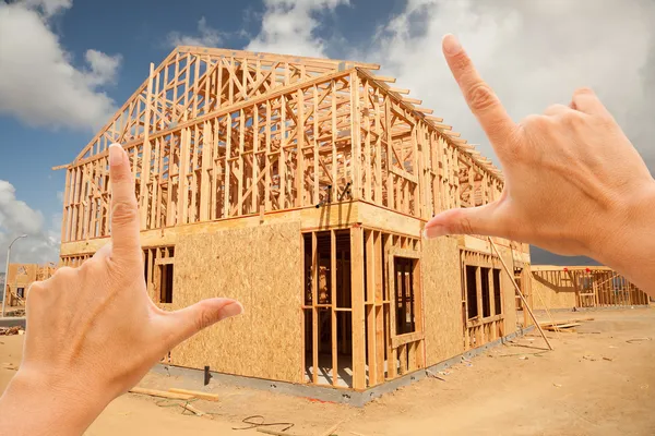 Female Hands Framing Home Frame on Construction Site — Stock Photo, Image