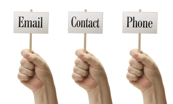 Три знака в кулаках говорит электронной почты, контакта и телефона — стоковое фото