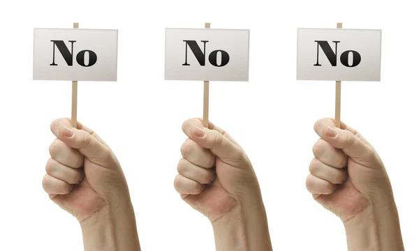 Drei Zeichen in den Fäusten, die Nein, Nein und Nein sagen — Stockfoto