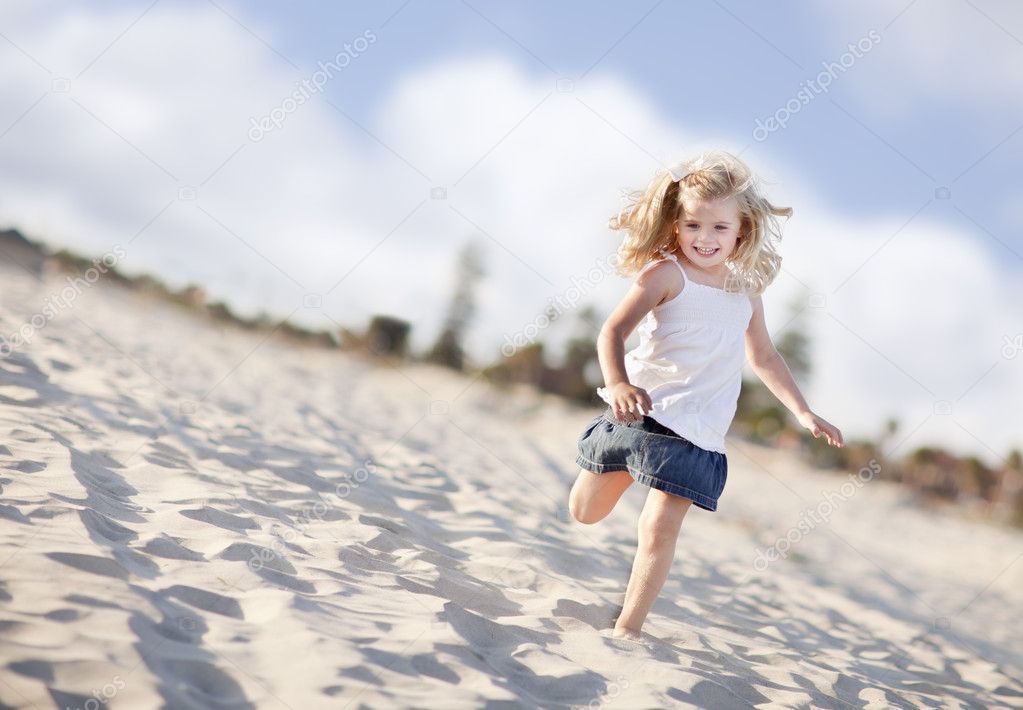 Adorable Little Girl Having Fun at the Beach