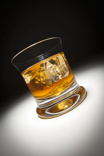 Glass of Whiskey and Ice Under Spot Light. — Stock Photo, Image