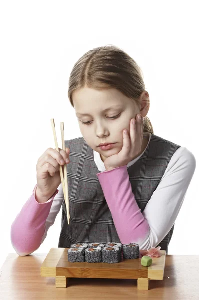 Girl with sushi — Stock Photo, Image
