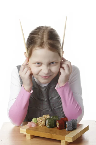 Chica con sushi — Foto de Stock