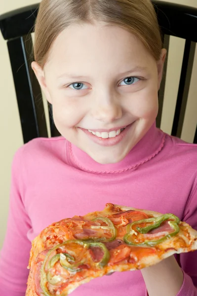 Cheerful little girl with pizza — Stock Photo, Image
