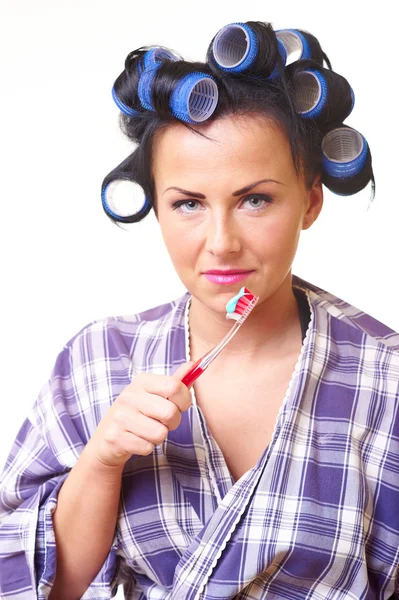 Displease housewife with tooth brush — Stock Photo, Image