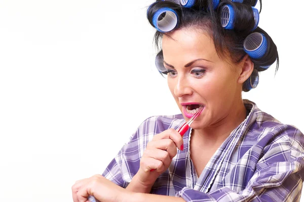 Unbehagen bei Hausfrau mit Zahnbürste — Stockfoto