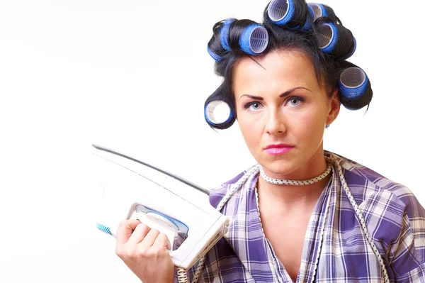 Displeased housewife with iron — Stock Photo, Image