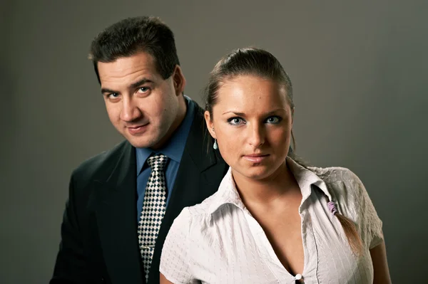 Young couple, man and woman, studio shot — Stock Photo, Image