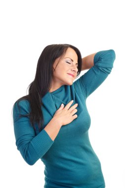 A young woman in a sweater isolated on white